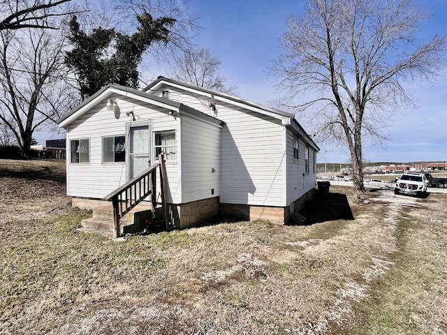 view of front of home with entry steps