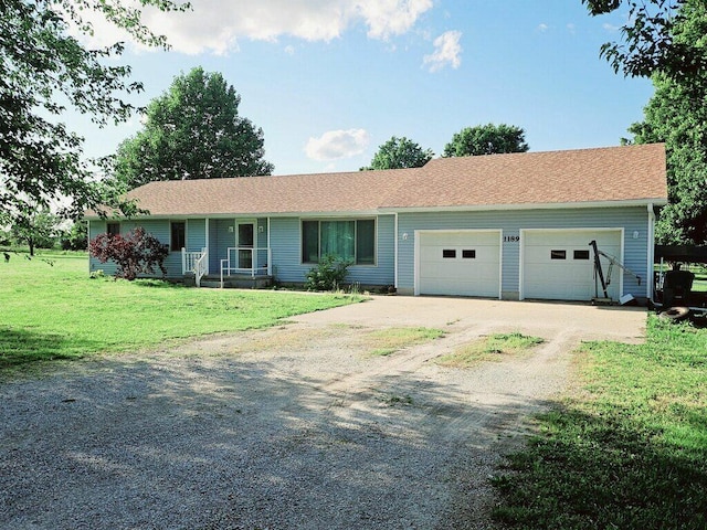 1189 S Sha Ree Ln, Bolivar, MO 65613 - ranch-style home featuring driveway, a garage, a front lawn, and a porch