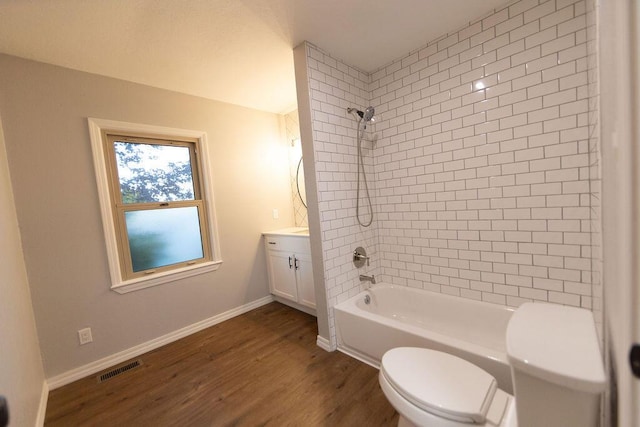 912 Armstrong Ave, West Plains, MO 65775 - full bath featuring wood finished floors, vanity, shower / washtub combination, toilet, and visible vents