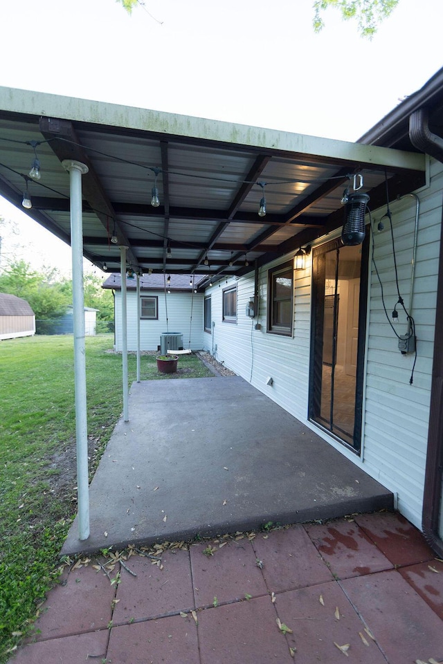 912 Armstrong Ave, West Plains, MO 65775 - view of patio / terrace with central AC unit