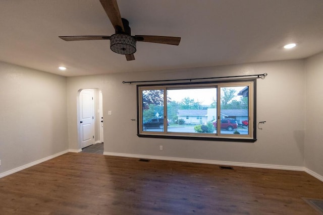 912 Armstrong Ave, West Plains, MO 65775 - unfurnished room featuring recessed lighting, wood finished floors, visible vents, arched walkways, and ceiling fan