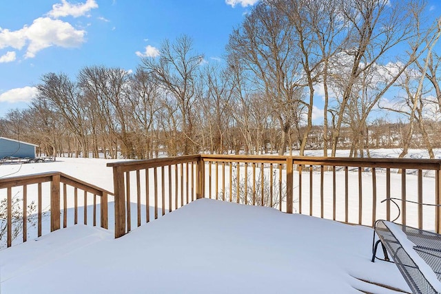 view of snow covered deck