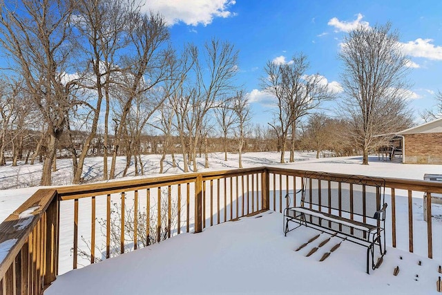 view of snow covered deck