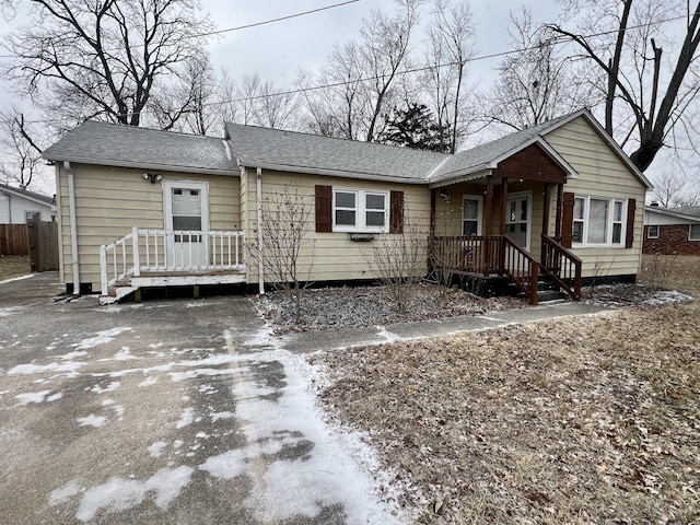 view of front of house featuring a shingled roof