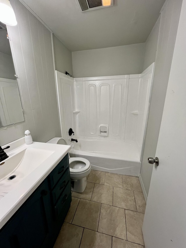 bathroom featuring visible vents, toilet, tile patterned floors, bathtub / shower combination, and vanity