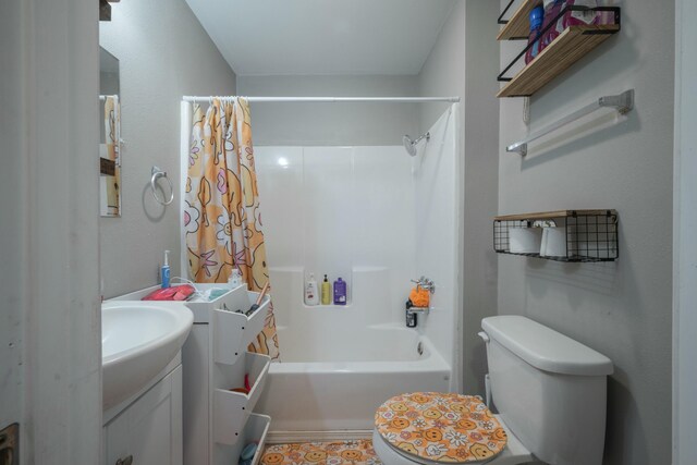 full bathroom with toilet, vanity, and shower / bathtub combination with curtain