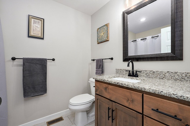 full bathroom featuring visible vents, toilet, vanity, tile patterned flooring, and baseboards