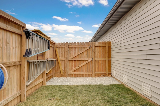 view of yard featuring a gate