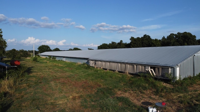 exterior space with an outbuilding and a pole building