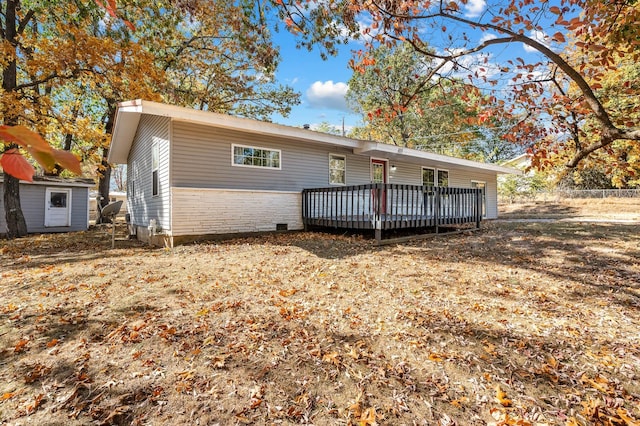 view of front of property with a deck