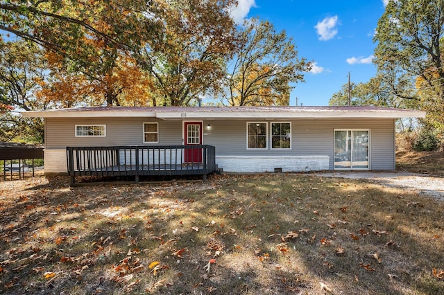 ranch-style house featuring metal roof, a front lawn, and crawl space