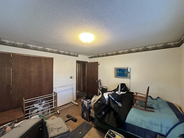 bedroom featuring a textured ceiling