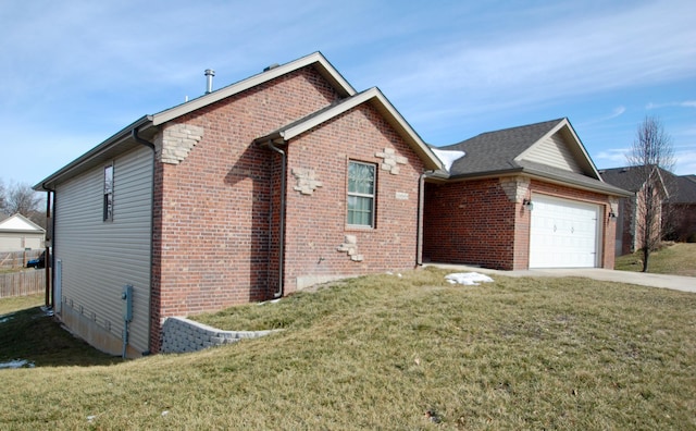 exterior space with a garage, concrete driveway, brick siding, and a front yard