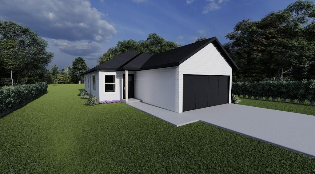 view of front of property with a garage, a front yard, and concrete driveway