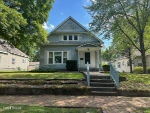 view of front of property with a front lawn