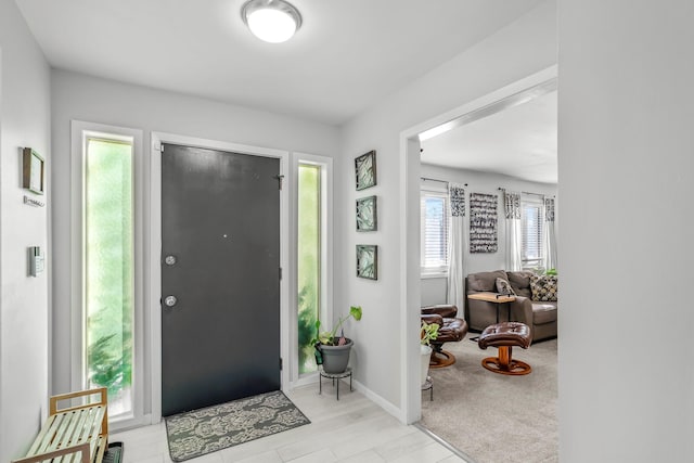 entrance foyer with baseboards