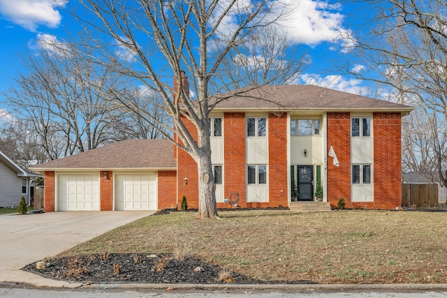 view of front of property with a garage, a front yard, concrete driveway, and brick siding