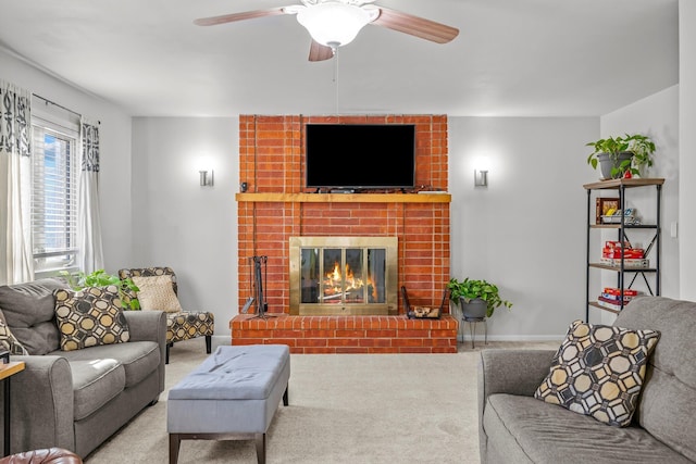 living room with ceiling fan, a fireplace, baseboards, and carpet flooring