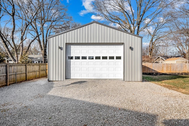 detached garage with fence