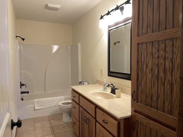 full bath featuring toilet, shower / tub combination, vanity, and tile patterned floors