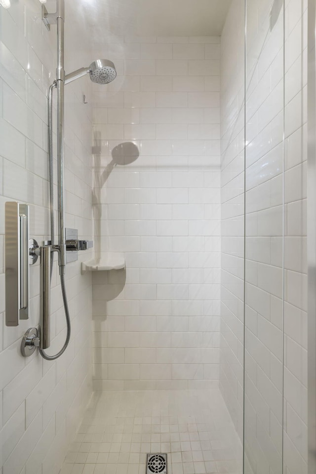 full bathroom with a shower stall