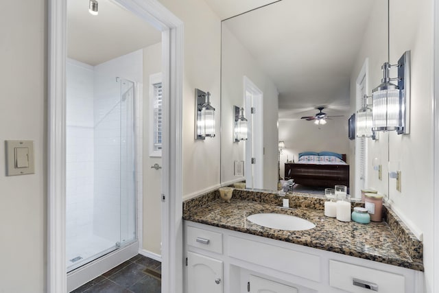 ensuite bathroom with a stall shower, ensuite bath, vanity, and a ceiling fan