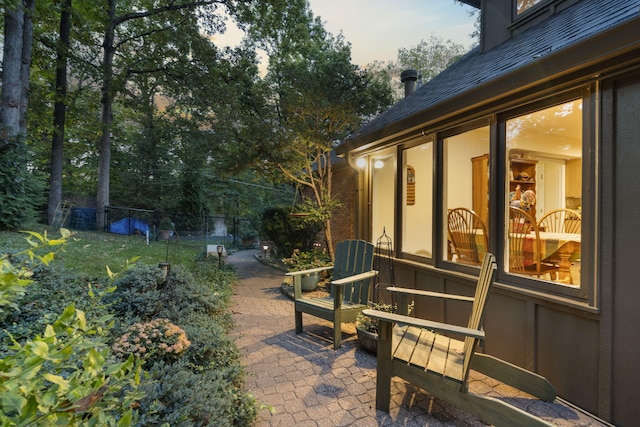 view of patio featuring fence