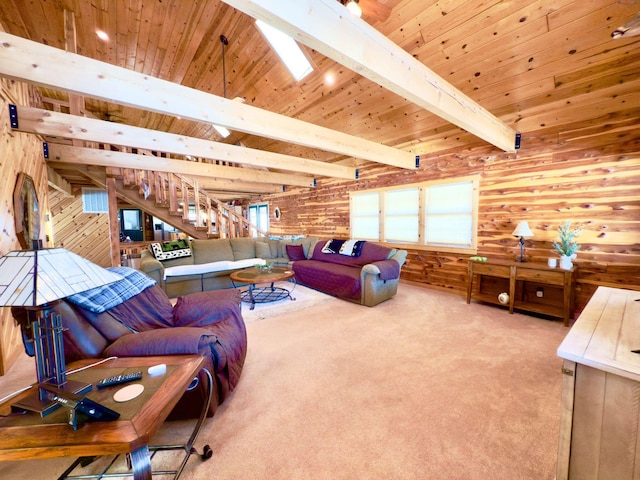 living room with wooden walls, wood ceiling, beamed ceiling, stairs, and carpet floors