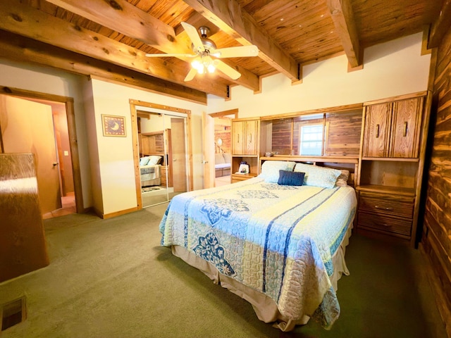 bedroom featuring wooden ceiling, visible vents, dark colored carpet, and beamed ceiling