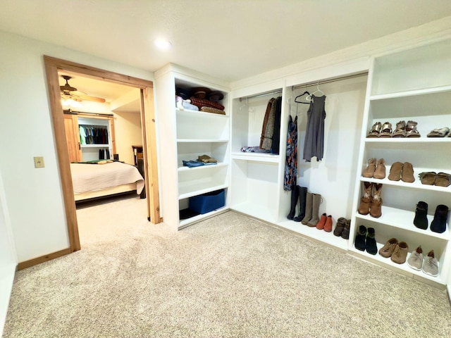 mudroom with carpet and baseboards