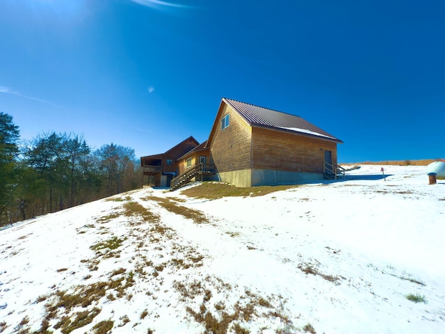 view of snow covered property