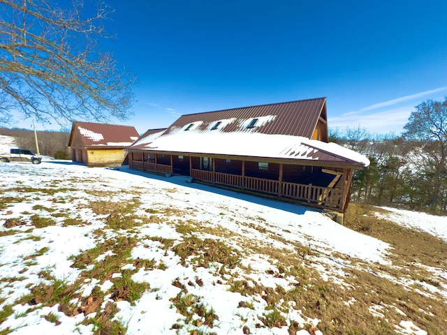 view of front of property with metal roof