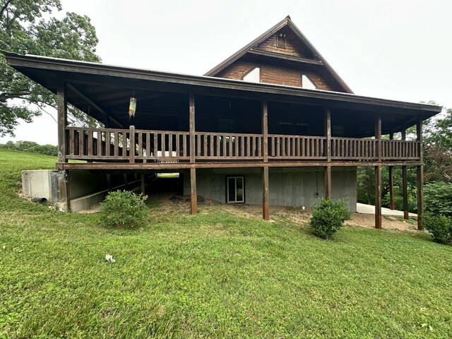 300 Roundup Ln, Bakersfield, MO 65609 - back of house featuring a lawn and a deck
