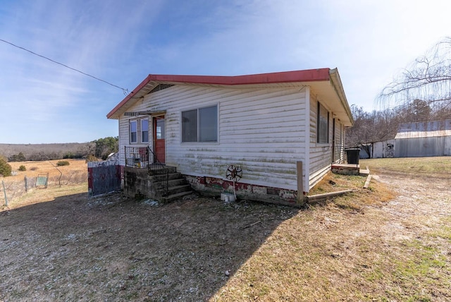 view of front of house with crawl space