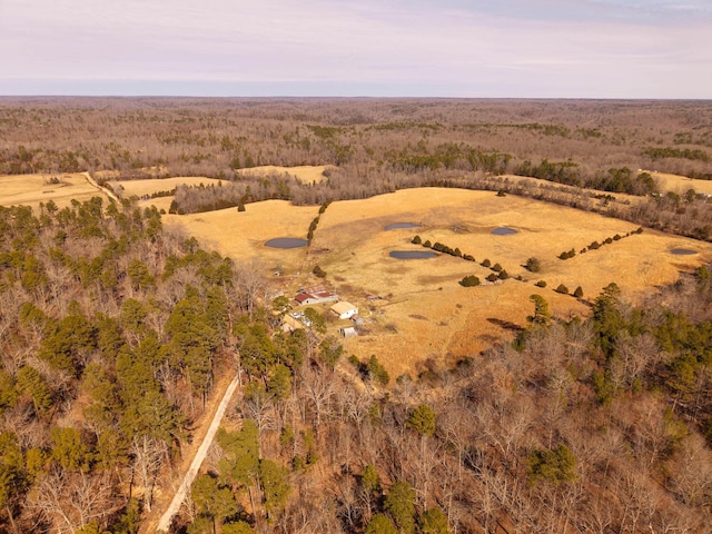 aerial view featuring a view of trees