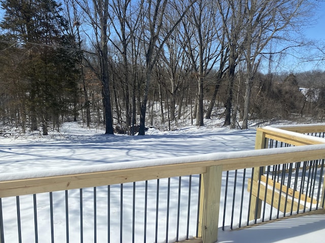 view of snow covered deck