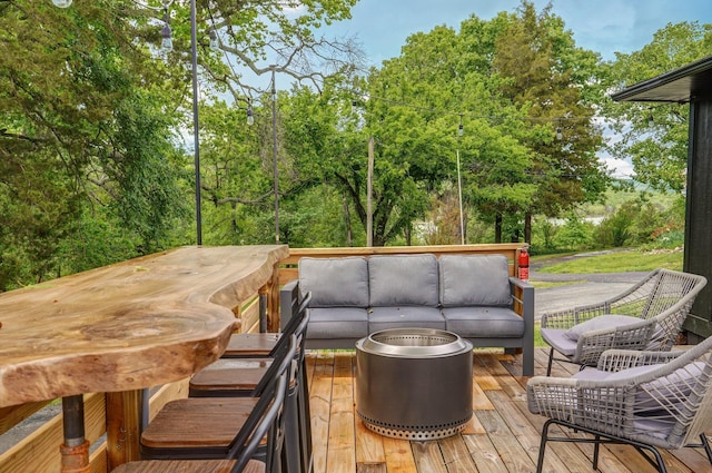 deck featuring outdoor lounge area