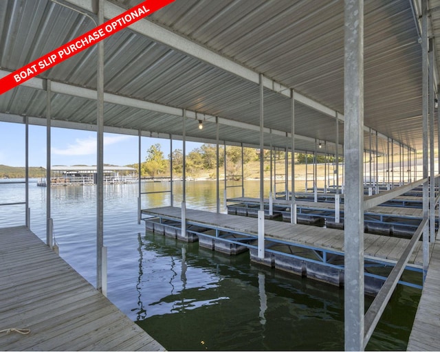 dock area featuring a water view