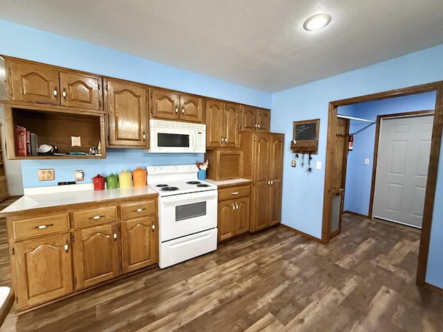 kitchen with brown cabinets, white appliances, dark wood-style floors, and light countertops