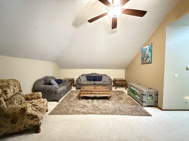 interior space with lofted ceiling, a ceiling fan, and baseboards