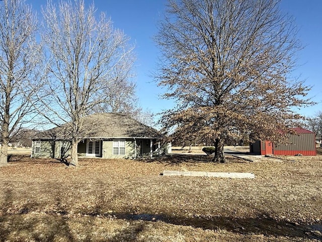 exterior space with an outbuilding