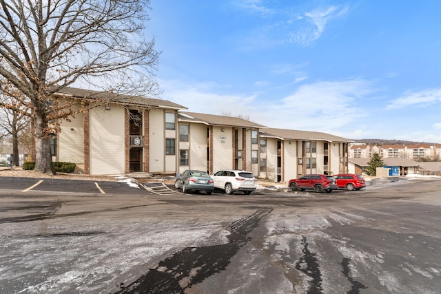 187 Clubhouse Dr Unit 19, Branson, MO 65616 - view of property featuring uncovered parking and a residential view
