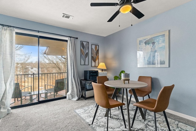 187 Clubhouse Dr Unit 19, Branson, MO 65616 - carpeted dining space with baseboards, visible vents, and a textured ceiling