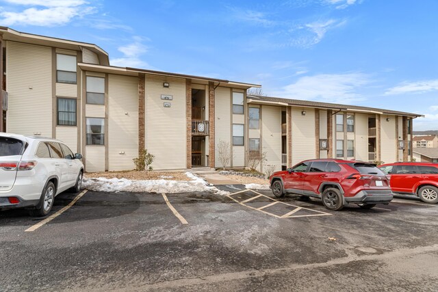 187 Clubhouse Dr Unit 19, Branson, MO 65616 - view of building exterior featuring uncovered parking