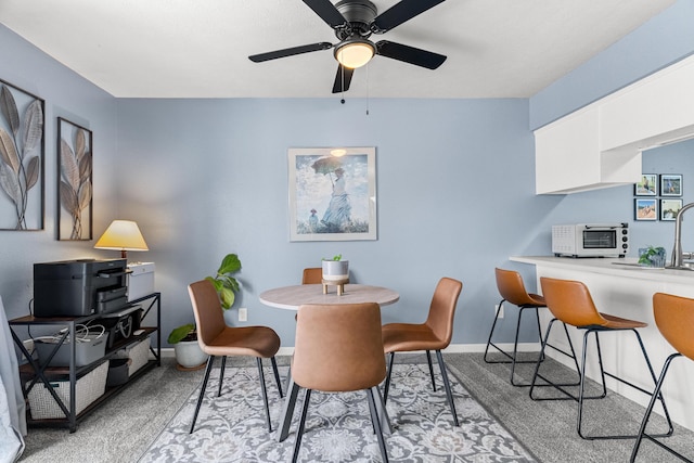 187 Clubhouse Dr Unit 19, Branson, MO 65616 - dining area with baseboards and light colored carpet