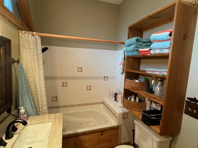 full bathroom with shower / tub combo with curtain, vanity, and toilet