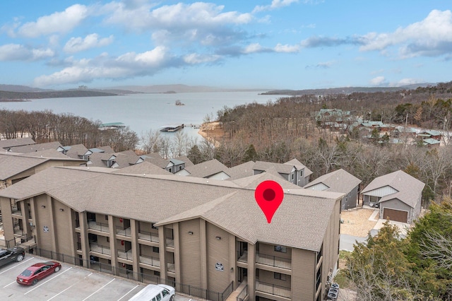 drone / aerial view with a water view
