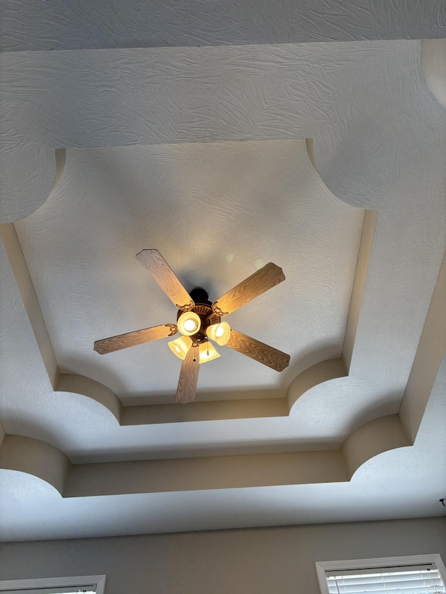 interior details with a tray ceiling