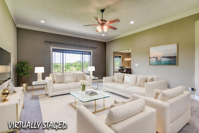 living room with ceiling fan, a textured ceiling, light carpet, baseboards, and crown molding