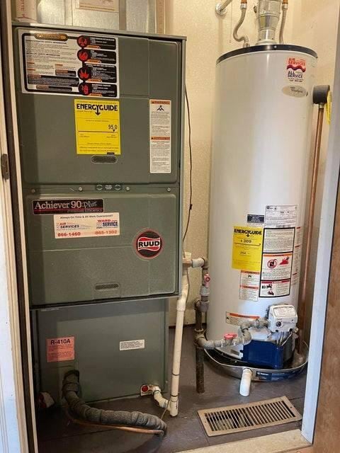 utilities with gas water heater and heating unit